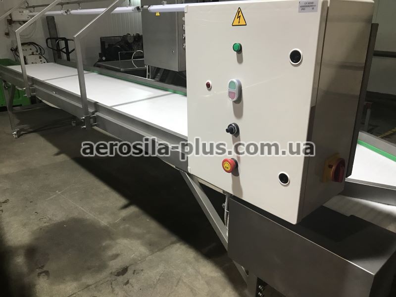 Stand for a multi-head weigher on a packaging line