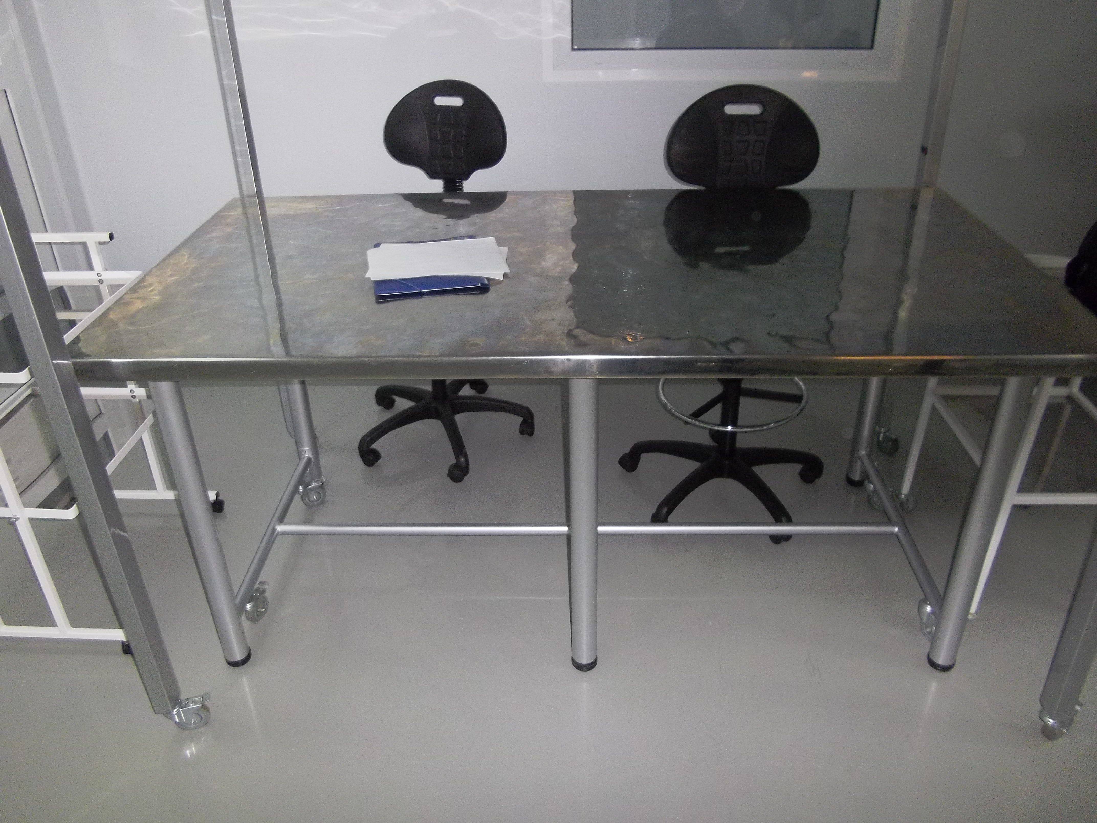 Stainless steel technological table for a food workshop